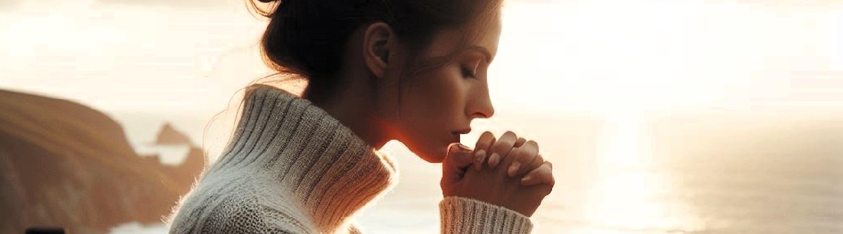 woman with folded hands praying devotedly